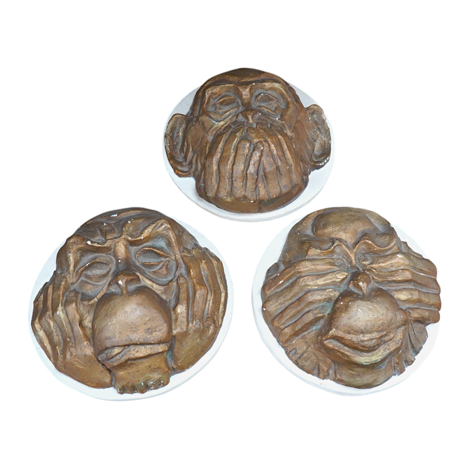 A set of ‘three wise monkeys’ plaster plaques, signed Alfred R. Martin, 22.5cm. Condition - fair to good